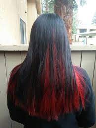 If you have naturally black hair and want a taste of highlights, i say go for something that is this hair color gives her hair a high shine. Black On Top Red Underneath Black Red Hair Underlights Hair Hair Styles