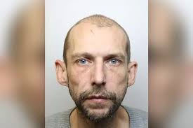 Addict dad threatened to stab security guard with drug needle