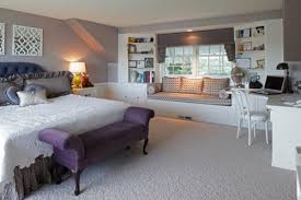 An abundance of natural light flows into the main bedroom from the wall of glass windows where occupants can enjoy unobstructed views of the mountains. 40 Window Seats Cozy Space Saving And Great For Admiring The Outdoors