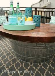 It has been made using pallet wood, so it surely will be inexpensive. Diy Ify 10 Clever Storage Ideas For Your Outdoor Space Diy Outdoor Table Outdoor Coffee Tables Diy Outdoor