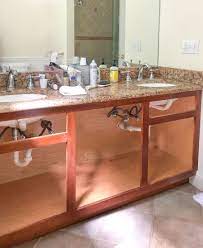 We actually prefer a third type of paint for cabinets, the hybrid enamel. Our Painted Bathroom Vanity The Before After And How To Guide Driven By Decor
