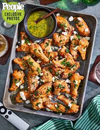 Bake for 35 to 45 minutes or until chicken wings are cooked through and crispy. Super Bowl 2021 Baked Greek Style Chicken Wings Recipe People Com
