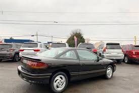 Image result for Black Gold 1995 Saturn