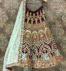 Ravishing Maroon Bridal Wear Wedding Lehenga Choli Vastraqueen Bridal lehenga boutique specialising in the latest indian/asian bridal wear check out our website. ravishing maroon bridal wear wedding