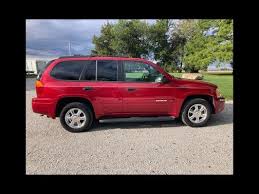 Image result for Medium Red 2002 Envoy