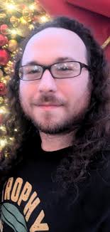 Who is good at cutting curly hair in Montevallo?