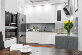 wooden dining table standing in a white