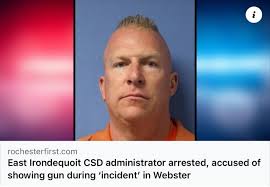Rochester, New York. An East Irondequoit school administrator was arrested  Wednesday for allegedly displaying a gun during a roadside incident in  Webster. Mark Anson, 47, was arrested for menacing in the second