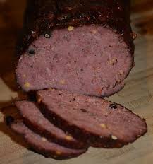 Steps for making sausage mix cold venison and pork fat by hand. Spicy Pepper Smoked Summer Sausage Summer Sausage Recipes Homemade Summer Sausage Smoked Food Recipes