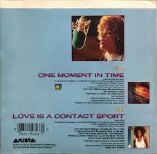 The song prominently features r&b singers faith evans and kelly price during the choruses and bridge. One Moment In Time U S Vinyl Single Back Cover Whitney Houston Official Site