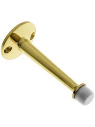 The same word is used to refer to a thin slat built inside a door frame to prevent a door from swinging through when closed. 3 3 X2f 4 Solid Brass Door Stop With Grey Black Rubber Tips House Of Antique Hardware Door Stopper Door Stop Door Decorations