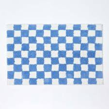 Although not thick, the plush, soft, tight loops of 100% cotton do a very good job of absorbing water. Blue White Check 100 Cotton Non Slip Bath Mat