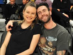 Adam levine and his wife behati prinsloo sandwich in his team of contestants at the season seven finale of the voice on tuesday (december 16) in los angeles. Adam Levine Wore A Dress To Have A Playdate With Behati Prinsloo And Their Two Daughters Glamour