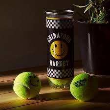 Get the ball of champions. Chinatown Market Smiley Tennis Ball Pack Of 3 Yellow End