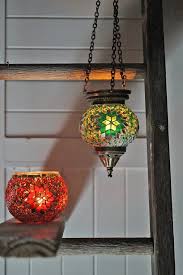 Vase market's hanging glass terrariums and candle holders made be sweet and romantic glass ornaments for any occasion, including weddings. Green Star Mosaic Hanging Candle Holder The Dancing Pixie