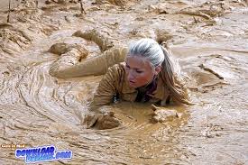 girl mud boots drone fest