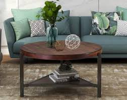 The most common round wood coffee table material is wood. Round Wood Coffee Table Etsy