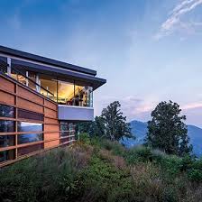 This log cabin has absolutely phenomenal mountain views and a setting to die for. Mountain Homes In Aspen Switzerland And North Carolina Architectural Digest