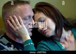 In this Friday, Jan. 10, 2014 photo, Jessica McAllister comforts her  husband Kainan McAllister during an interview with The Associated Press in  Chalmette, La. Kainan is the brother of Denise Freeman, the