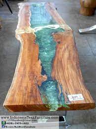 When you want to turn a piece of wood into a colorful and durable piece of art, epoxy resin is one of the best tools in the box. Tar 11 Natural Curve Wood Table Steel Timber Table Resin Table Resin Furniture