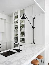 Using black hardware and finishing in a white bathroom will certainly give it a very modern feel. Kitchen Bath Trend Black Hardware Fixtures Coco Kelley Coco Kelley
