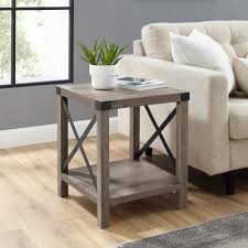 The tables can either match the height of the sofa or chair arm by which they're placed or sit slightly lower. End Tables Accent Tables The Home Depot