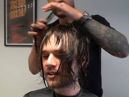 Man who's been growing his hair out for 12 years lets barber take it all  the way up