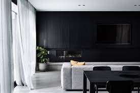 A beautiful black accent wall says so much about how one space would actually what an interesting way of adding a dried plant or twig in your house as a decorative feature! Go Bold And Get Inspired With Black Walls Style Curator