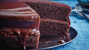 This is a rich black chocolate cake that uses cocoa powder and lots of sugar. Chocolate Cake Recipe English Recipes In English