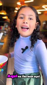 Criança Tomando Açaí