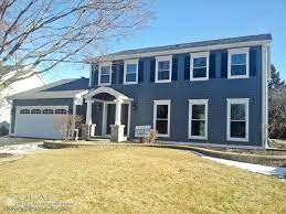 In new england, the colonial house was informed by english precedent. Dark Blue White House In Naperville With James Hardie Siding Andersen Windows Exterior Chicago By Opal Enterprises Inc Houzz