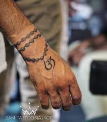 You can also try this creative om tattoo design which has three elements in it. 20 Spiritual Om Tattoo Designs Ideas For Both Men And Women Tikli