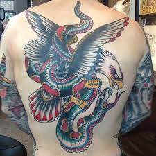 Jake Miller Eagle And Snake Tattoo Eagle Tattoo Binspired Tattoos Eagle Tattoo Back Piece Tattoo