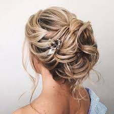Beautiful Wedding Updos For Any Bride Looking For A Unique Style Romantic Updo Hairstyles Unique Wedding Hairstyles Hair Styles