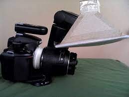 See this guy in action in this article: Preferred Flash Diffuser For Macro Work Macro And Still Life Photography Forum Digital Photography Review