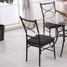 Stylifing dining table and chairs set round clear glass top crisscrossing chrome metal legs kitchen table and 4 sled based grey faux leather chairs dining set home kitchen office waiting room use. China Stylish 5 Piece Glass Top Dining Table Set China Round Glass Dining Table Round Dining Table