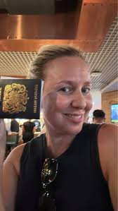 Waiting patiently for a flight to Milan as the 1st solo trip as a divorcee