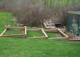 Vegetable Garden On A Slope Backyard Tiered Vegetable Garden Haunted Swamp Designs Bluebirds And Blueber Sloped Garden Sloped Backyard Building A Raised Garden