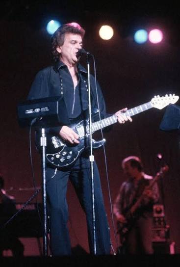 Can you hear a photograph? If so, what do you think Conway Twitty is singing here?