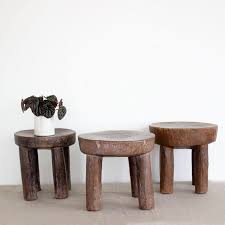 We Found These Vintage African Milking Stools At A Lovely Market We Think Milking Stool Fire Pit Table And Chairs Blue And White Rug