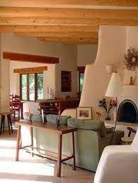The territorial style is considered to be a blend of pueblo and victorian styles. 120 Adobe House Interiors Ideas Adobe House Spanish Style Homes Hacienda Style