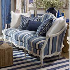 The traditional striped pattern with vibrant hues mixes well with a neutral color palette, and its versatile look goes great on your couch or outside near the pool. Verandah House Introducing Ralph Lauren Spring 2010 Blue Rooms Blue Decor Country Living Room Design