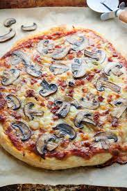 Mushroom Pizza With Pancetta And Caramelized Onions Baker By Nature Recipe Mushroom Pizza Delicious Pizza Recipes Delicious Pizza