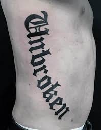 Mystic lady of justice, holding the globe in one hand and lettering judged at the bottom in old english. Everything You Need To Know Before Getting A Lettering Tattoo