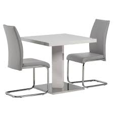 View our large range of high gloss dining tables and 8 chairs all with modern style and come with a choice of colours in white, black, grey or cream with extending options. Como White Gloss Square 2 Seater Dining Set With Grey Chairs