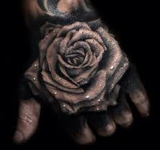 Pin By Macxcentral On Tattos Rose Tattoos For Men Black Rose Tattoos Hand Tattoos For Guys