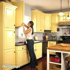 painting kitchen cabinets how to spray