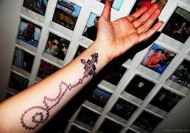 Korean tiger, when inked on the body, signifies power and patience. 52 Great Rosary Tattoos On Arm