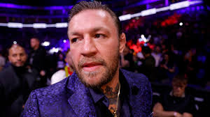 Conor McGregor's chaotic cameo at Anthony Joshua's win is the latest  episode in a turbulent year for the UFC superstar... he hospitalised a  mascot, necked whisky at a bare-knuckle fight and there was a police probe  at his late aunt's wake