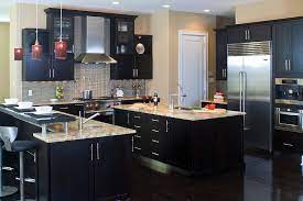 A Contemporary Kitchen Featuring Cherry Cabinets With A Dark Coffee Color Finish Dark Kitchen Cabinets Cheap Kitchen Cabinets Kitchen Cupboard Designs